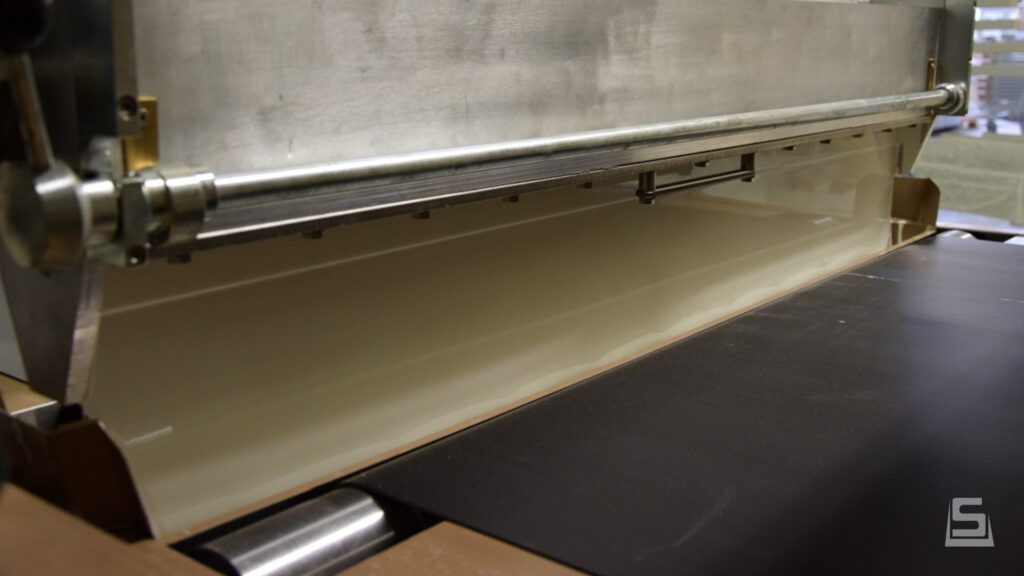 Soest Machinery | Curtain coating machine - Close up #1 | For precise industrial curtain coating. View here.